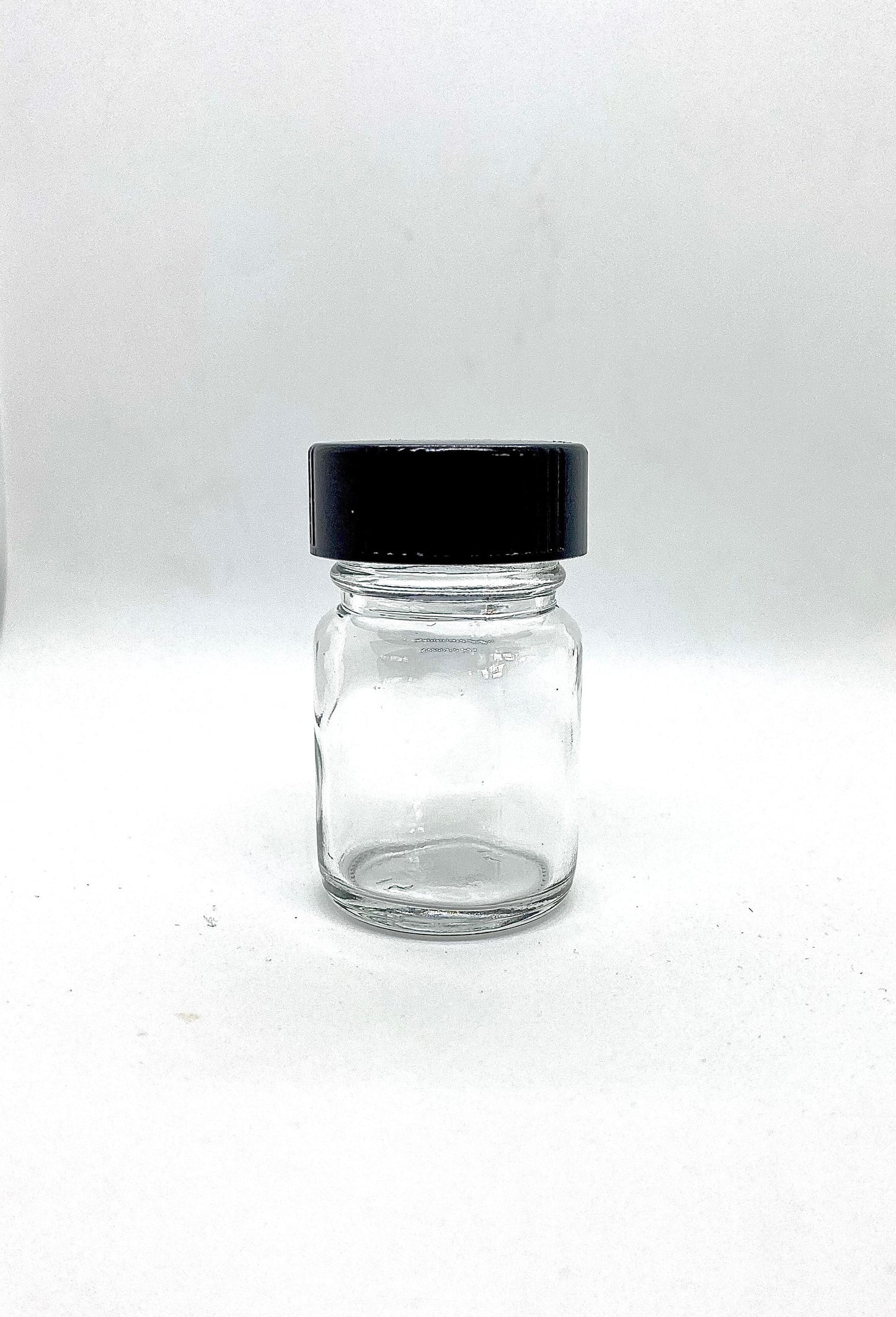 One 15 ml (.5 oz) Clear Glass Wide Mouth Bottle with Cone Lined Cap